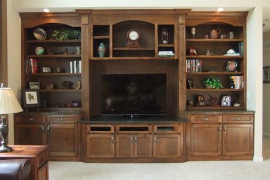 Mid-sized elegant carpeted and white floor living room photo in St Louis with beige walls, no fireplace and a media wall