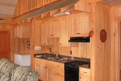Example of a mountain style kitchen design in Other
