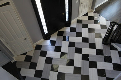 Example of a trendy entryway design in New York
