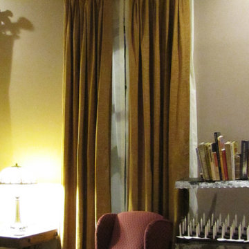Gold luxe velvet curtains in eclectic family room.