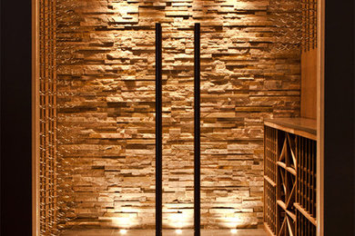 Example of a minimalist wine cellar design in Vancouver