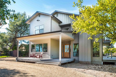 Inspiration for a mid-sized country two-storey grey house exterior in San Francisco with wood siding and a gable roof.