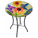 Teamson Home - Solar Bird Bath & Stand Outdoor Garden - Provide a gathering space in your backyard for your feathered friends with the Teamson Home 18" Outdoor Solar Glass Butterfly Birdbath with LED Lights and Stand. This colorful glass birdbath provides a sanctuary for all types of birds while also adding a pop of color to your outdoor living space, yard, or lawn. Featuring a multi-colored design with flowers and butterflies, this stylish lawn decoration creates visual interest in your outdoor area. Fill this birdbath with water or with seed to transform it into a colorful feeder. This birdbath also includes a solar cell that charges during the day and lights up the built-in LEDs at night to illuminate your garden. Constructed from sturdy and resilient glass with an included metal stand, the bird bowl is built for years of quality outdoor use. The sturdy metal legs provide stability and prevents tipping when multiple birds gather on the bowl. For easy setup, teardown, and storage when not in use, the metal stand can fold down to a compact size. This butterfly birdbath is both stylish and functional, and it provides a fun addition to your courtyard, patio, or yard. This compact birdbath measures 18"L x 18"W x 21.2"H to fit almost any outdoor area.