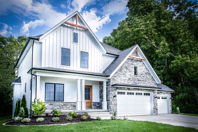 Mid-sized cottage white two-story wood exterior home photo in Chicago with a shingle roof