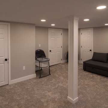 Bathroom/Laundry Room Using Warmer Tones, Accented by New Laundry Facility