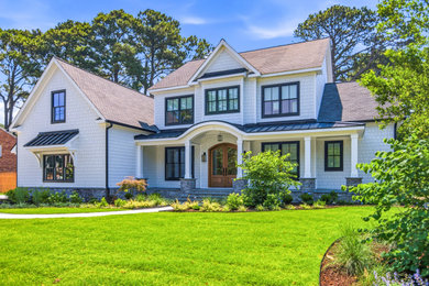 Example of a transitional exterior home design in Other