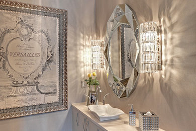 Inspiration for a transitional powder room remodel in Minneapolis with a vessel sink