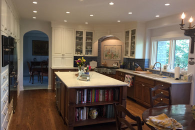 Example of a french country kitchen design in Denver
