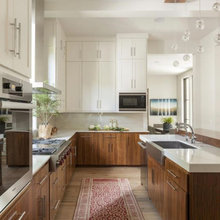 Wood kitchens with white uppers / white counters