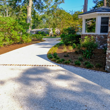 After picture of side of house and new driveway