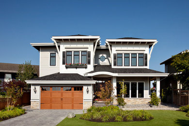 Inspiration for a transitional gray two-story concrete fiberboard exterior home remodel in Vancouver