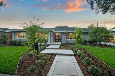 Large transitional gray one-story wood house exterior photo in San Francisco with a gray roof