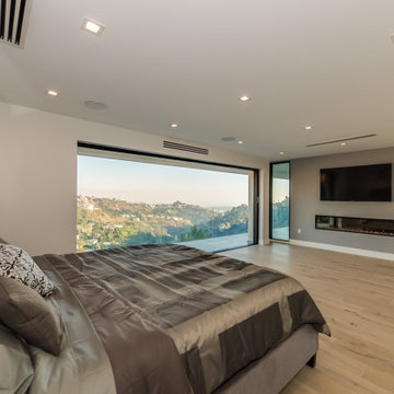 Bedroom Opening to the Terrace Through Pocketing Sliders