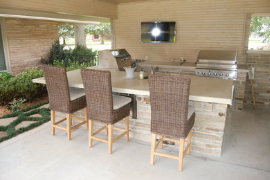 Patio - mid-century modern patio idea in Other
