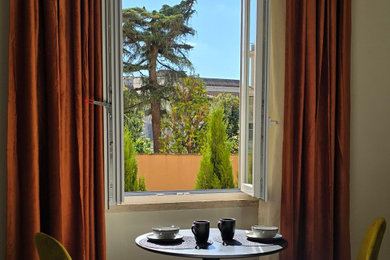 Trendy bedroom photo in Rome
