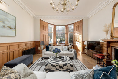 This is an example of a victorian living room in Edinburgh with a dado rail.