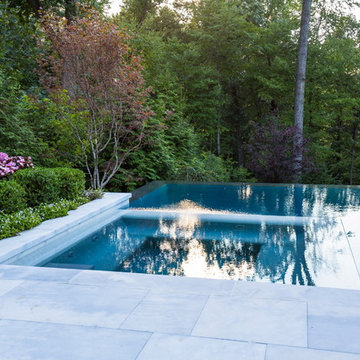 Luxury vanishing edge swimming pool and outdoor living area Ridgewood NJ