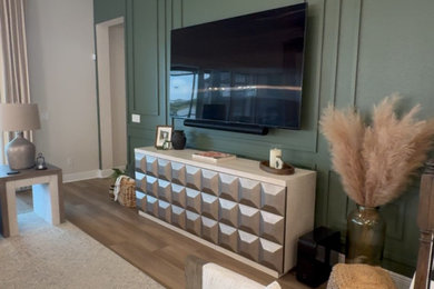 Example of a minimalist family room design in Tampa