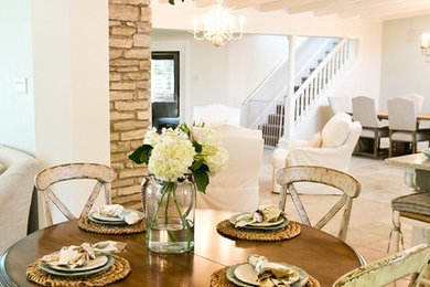Inspiration for a traditional dining room in Austin with white walls.