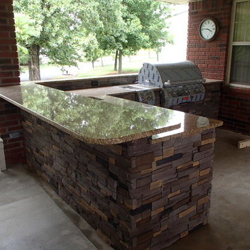 L Shaped Outdoor Kitchen With Unique Lighting