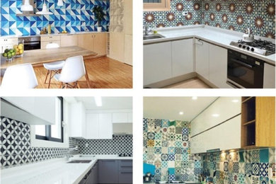 Eat-in kitchen - mid-sized eclectic l-shaped cement tile floor eat-in kitchen idea in New York with a double-bowl sink, flat-panel cabinets, light wood cabinets, onyx countertops, multicolored backsplash, cement tile backsplash, black appliances and an island