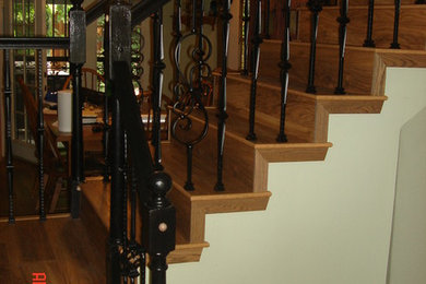 Inspiration for a large traditional wood l-shaped staircase in Other with wood risers.