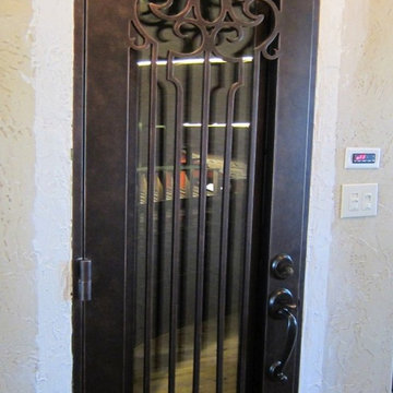 Venetian View Wrought Iron Door with Operable Glass-Custom Wine Cellar Door-Texa