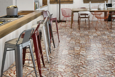 Example of a large classic galley ceramic tile and multicolored floor enclosed kitchen design in Dallas with open cabinets, white cabinets, wood countertops, stainless steel appliances and no island