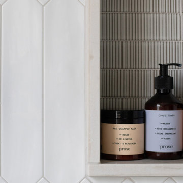 Wet Room Oasis versus Cigar Lounge Style in Dual Bath Remodel