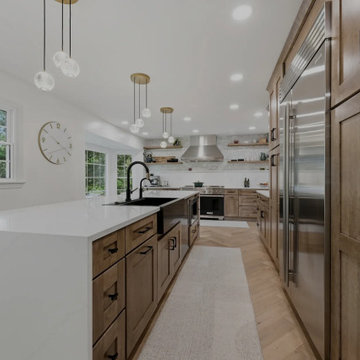Warm Cherry Kitchen and Powder Room Remodel with Waterfall Island in Herndon, VA