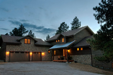 Transitional brown two-story wood exterior home photo in Denver