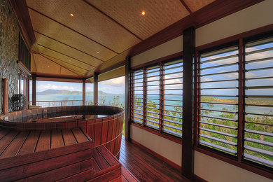 This is an example of a tropical sunroom in Cairns.