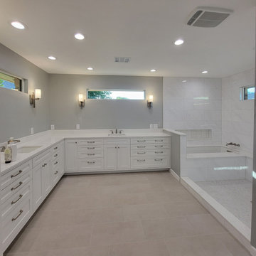 Two separate bathrooms converted into a master bathroom with a big open closet
