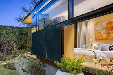 Inspiration for a modern master bedroom remodel in Austin