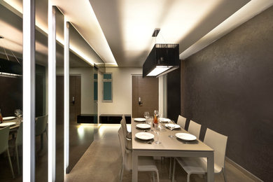 Contemporary dining room in Mumbai.