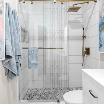 Modern Walk-In Shower with Vertical Tile and Gold Hardware