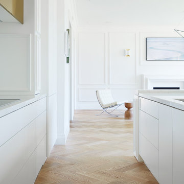 Sleek, White, Quartz-Embellished Kitchen