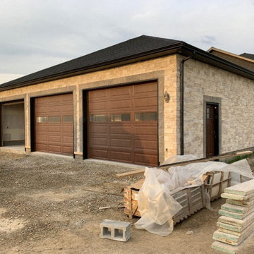 Primavera Natural Thin Stone Veneer Three Car Garage