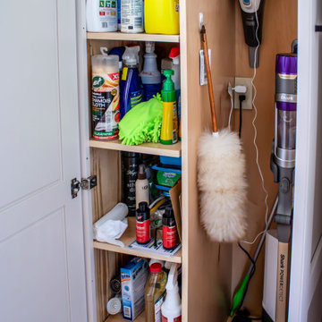 Laundry Room with Custom Cabinetry Quartz Countertop and Custom Floating Shelf