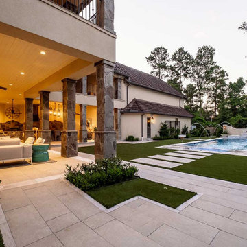 Rectangular pool, covered patio and kitchen, outdoor shower, landscaping