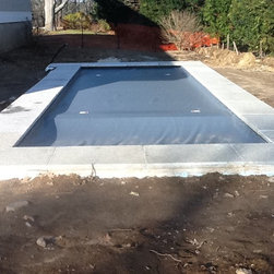 Reclaimed Granite Used as Pool Coping - Landscaping Stones And Pavers