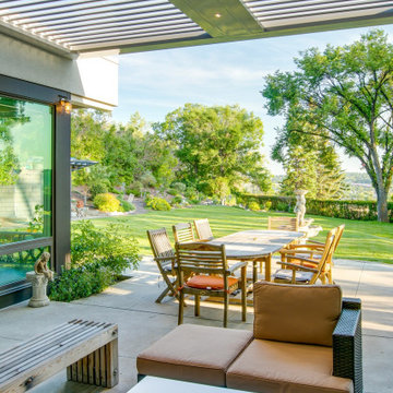 North Calgary StruXure Adjustable Pergola over Outdoor Sitting Area