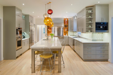 Eat-in kitchen - large contemporary u-shaped light wood floor and beige floor eat-in kitchen idea in Richmond with an undermount sink, flat-panel cabinets, gray cabinets, quartz countertops, beige backsplash, ceramic backsplash, stainless steel appliances, an island and gray countertops