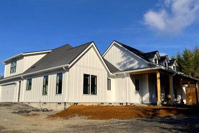Example of a country exterior home design in Portland