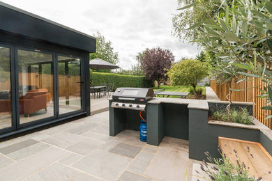 Photo of a medium sized back formal partial sun garden for summer in Berkshire with decking.