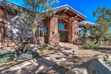 Inspiration for a rustic home design remodel in Phoenix