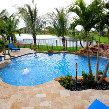Tropical Style Pool With Rock Waterfall and Raised Spa in Delray Beach, Florida