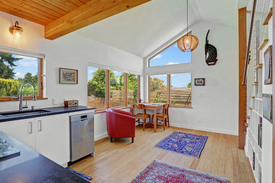 Example of a small transitional home design design in Seattle
