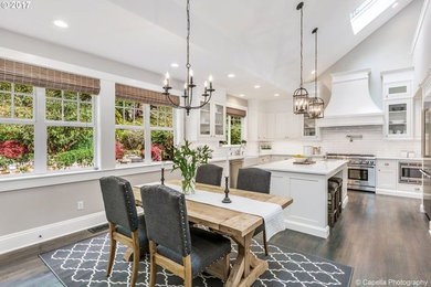 Inspiration for a large transitional u-shaped kitchen remodel in Portland with recessed-panel cabinets, white cabinets, quartz countertops and white countertops