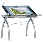 Studio Designs - Futura Craft Station With Folding Shelf, Silver and Blue Glass - The perfect multi-functional contemporary table: Studio Designs' Futura Craft Station with Folding Shelf is great for drafting, drawing, or crafting on its large tempered safety-glass work surface. Its main work surface consists of a 35.5"W x 23.75"D glass top that can also be used as a light table, and can adjust up to 35 degrees. It also includes a 9.5" x 23.75" flip up side shelf for that additional flat workspace. Other features include a large pencil drawer, and 4 removable side trays for supplies. A 24 pencil ledge slides up and locks into place if you'd rather keep pens, pencils, or brushes on the table top. Constructed of heavy gauge, powder-coated steel for durability and 4 floor levelers for stability. Available styles: Silver/Blue Glass, Black/Clear Glass, White/ Clear Glass. Main work surface: 35.5''W x 23.75''D. Pencil drawer dimensions: 34.5''W x 9.25"D. Overall dimensions: 50.25"W x 23.75"D x 31.5"H. (Additional item accessory sold separately: Futura Leg Extensions in Silver #10051, and Black #10073, Light Pad Metal Support Bars in Silver #10049, White #10094, and Black#10074)